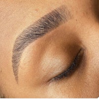 a close up of a woman's eyebrows
