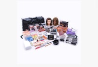 a bag filled with cosmetics, brushes, and other items