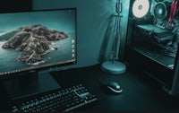 a computer with a monitor, keyboard and mouse